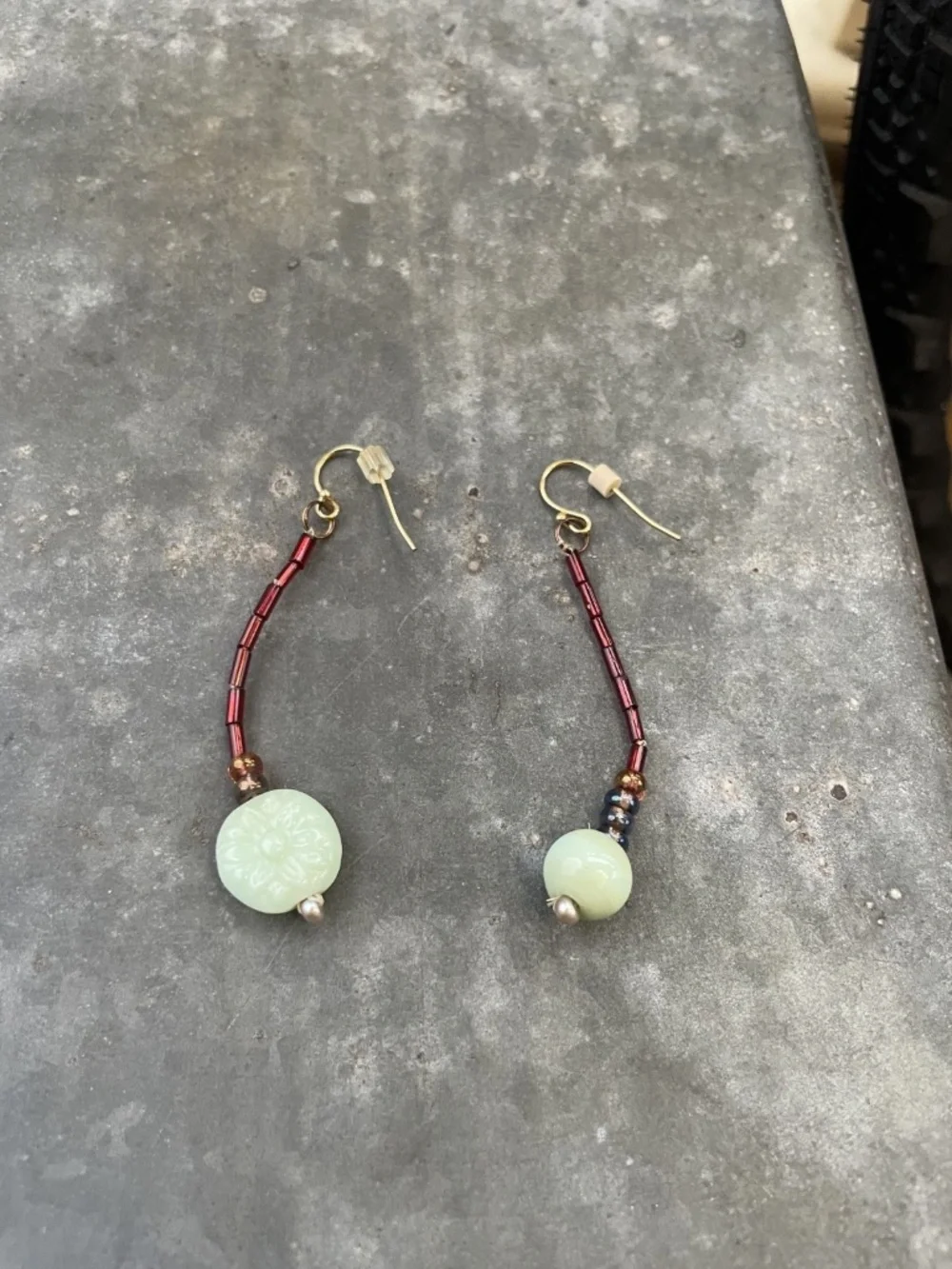 Artisan green and red beaded Drop Earrings with flower etching